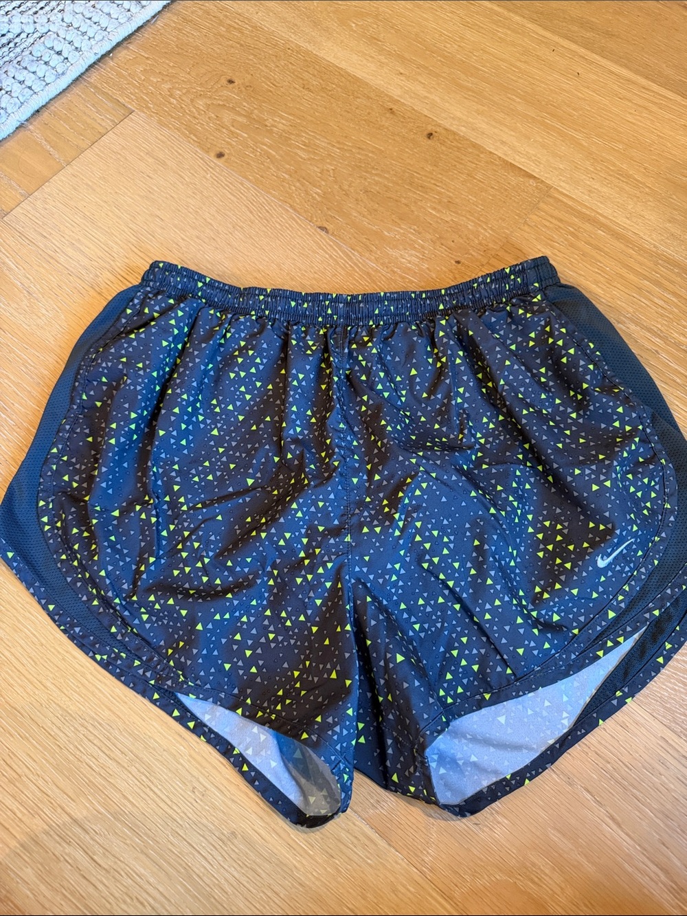 Nike Women's Black Running Shorts with Neon Green Triangle Print